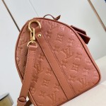 Louis Vuitton Speedy Soft 30 Handbag with Monogram Empreinte Leather and Suede Lining
