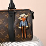Louis Vuitton Nano Keepall Cartoon Embroidered Handbag M80201 featuring embroidered scarecrow and monster characters