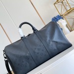 Louis Vuitton Keepall Bandoulière 45 travel bag in Monogram Midnight coated canvas with leather trim
