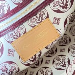 Louis Vuitton Speedy Soft 30 Monogram Anniversary handbag in Monogram canvas with leather trim and travel-inspired accessories