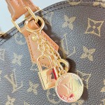 Louis Vuitton Alma MM Monogram Ostrich Trim Limited Edition N30049
