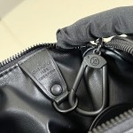 Louis Vuitton-inspired Speedy P9 Bandoulière 20 replica handbag in black silver and orange glossy leather style