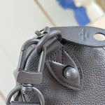 Louis Vuitton-inspired Speedy P9 Bandoulière 20 replica handbag in black silver and orange glossy leather style