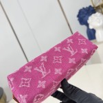 Louis Vuitton-inspired Pochette Cosmétique small replica cosmetic pouch in rose pink and blue Monogram denim style
