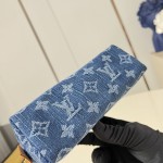 Louis Vuitton-inspired Pochette Cosmétique small replica cosmetic pouch in rose pink and blue Monogram denim style