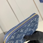 Louis Vuitton-inspired Pochette Cosmétique small replica cosmetic pouch in rose pink and blue Monogram denim style