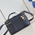 Louis Vuitton-inspired Low Key Vanity Pouch replica handbag in brown and black with brass-style lock