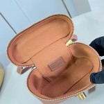 Louis Vuitton-inspired Low Key Vanity Pouch replica handbag in brown and black with brass-style lock