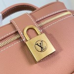 Louis Vuitton-inspired Low Key Vanity Pouch replica handbag in brown and black with brass-style lock