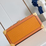 Louis Vuitton-inspired Out Of The Trunk Speedy 30 replica handbag with Monogram-style upper and metal trunk-style corners