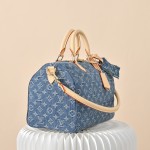 Louis Vuitton Speedy Bandoulière 30 Monogram Denim Blue Handbag M14430 with leather handles and detachable shoulder strap