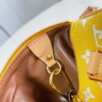 Louis Vuitton Speedy P9 Bandoulière 20 glossy cowhide leather handbag M28186 in yellow and bright red with rolled handles and adjustable shoulder strap