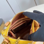 Louis Vuitton Speedy P9 Bandoulière 20 glossy cowhide leather handbag M28186 in yellow and bright red with rolled handles and adjustable shoulder strap