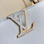 Louis Vuitton Capucines East-West Why Knot Taurillon leather handbag in mini and small sizes with Monogram beaded chain and shiny metal hardware