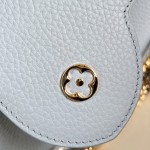 Louis Vuitton Capucines East-West Why Knot Taurillon leather handbag in mini and small sizes with Monogram beaded chain and shiny metal hardware