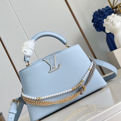 Louis Vuitton - Capucines East West Why Knot Taurillon Leather Handbag M28199 / M27309 / M27308