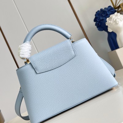 Louis Vuitton - Capucines East West Why Knot Taurillon Leather Handbag M28199 / M27309 / M27308
