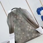 Louis Vuitton Discovery PM M29769 Monogram Surplus backpack with leather trim and front zip pocket