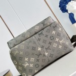 Louis Vuitton Discovery PM M29769 Monogram Surplus backpack with leather trim and front zip pocket
