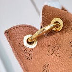 Louis Vuitton Carmel Hobo M27446 Taurillon grained leather shoulder bag with perforated leather and twist-lock closure