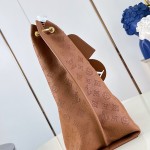 Louis Vuitton Carmel Hobo M27446 Taurillon grained leather shoulder bag with perforated leather and twist-lock closure