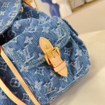Louis Vuitton Montsouris Cargo M27330 Denim Rendez-Vous backpack with leather trim and braided charm
