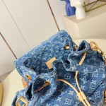 Louis Vuitton Montsouris Cargo M27330 Denim Rendez-Vous backpack with leather trim and braided charm