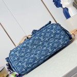 Louis Vuitton Montsouris Cargo M27330 Denim Rendez-Vous backpack with leather trim and braided charm