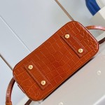 Louis Vuitton Alma BB M53152 Monogram canvas handbag with crocodile-embossed leather trim, Toron handles, padlock, and adjustable shoulder strap