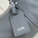 Louis Vuitton Needle M28000 Monogram canvas handbag with leather side bands and top handle