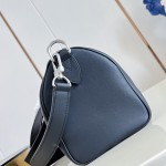Louis Vuitton Needle M28000 Monogram canvas handbag with leather side bands and top handle