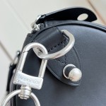 Louis Vuitton Needle M28000 Monogram canvas handbag with leather side bands and top handle