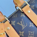 Louis Vuitton Keepall Bandoulière 25 M28957 Monogram Archive coated canvas bag with cowhide leather trim, aged metal hardware, top handle, and adjustable strap