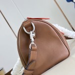 Louis Vuitton Needle M28000 Monogram canvas handbag with leather side bands and top handle
