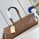 Louis Vuitton Needle M28000 Monogram canvas handbag with leather side bands and top handle