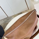 Louis Vuitton Vagabond Hobo M28392 soft tanned leather shoulder bag with an adjustable woven strap, padlock, and LV Blason jacquard lining