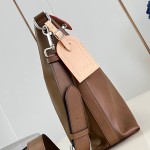Louis Vuitton Vagabond Hobo M28392 soft tanned leather shoulder bag with an adjustable woven strap, padlock, and LV Blason jacquard lining