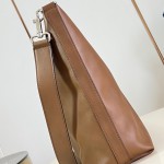 Louis Vuitton Vagabond Hobo M28392 soft tanned leather shoulder bag with an adjustable woven strap, padlock, and LV Blason jacquard lining