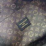 Louis Vuitton Flight Mode Express Medium suede leather replica handbag with Monogram canvas trim, key bell, and padlock