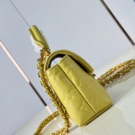 Louis Vuitton Nano Madeleine M29378 Monogram Empreinte leather handbag in Yellow and Purple