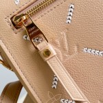 Louis Vuitton Pochette Métis M29497 Monogram Empreinte leather handbag with S-lock closure