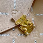 Louis Vuitton Pochette Métis M29497 Monogram Empreinte leather handbag with S-lock closure