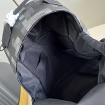 Louis Vuitton Discovery Cargo Backpack M28785 Monogram Midnight coated canvas backpack with front zip pocket