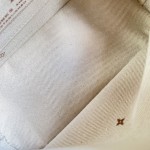 Louis Vuitton Alma BB M2A378 Monogram Emblème jacquard canvas handbag with VVN leather trim and padlock