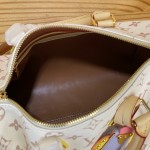 Louis Vuitton Speedy Bandoulière 25 M2A038 Monogram Dune bag with contrasting leather trim
