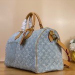 Louis Vuitton-style Speedy Bandoulière 30 M2A209 blue Monogram denim bag with leather trim heart tag and V-stitch pocket