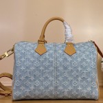 Louis Vuitton-style Speedy Bandoulière 30 M2A209 blue Monogram denim bag with leather trim heart tag and V-stitch pocket