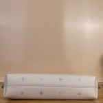 Louis Vuitton-style CarryAll East-West M2A369 white Monogram Empreinte XL bag with purple gradient interior